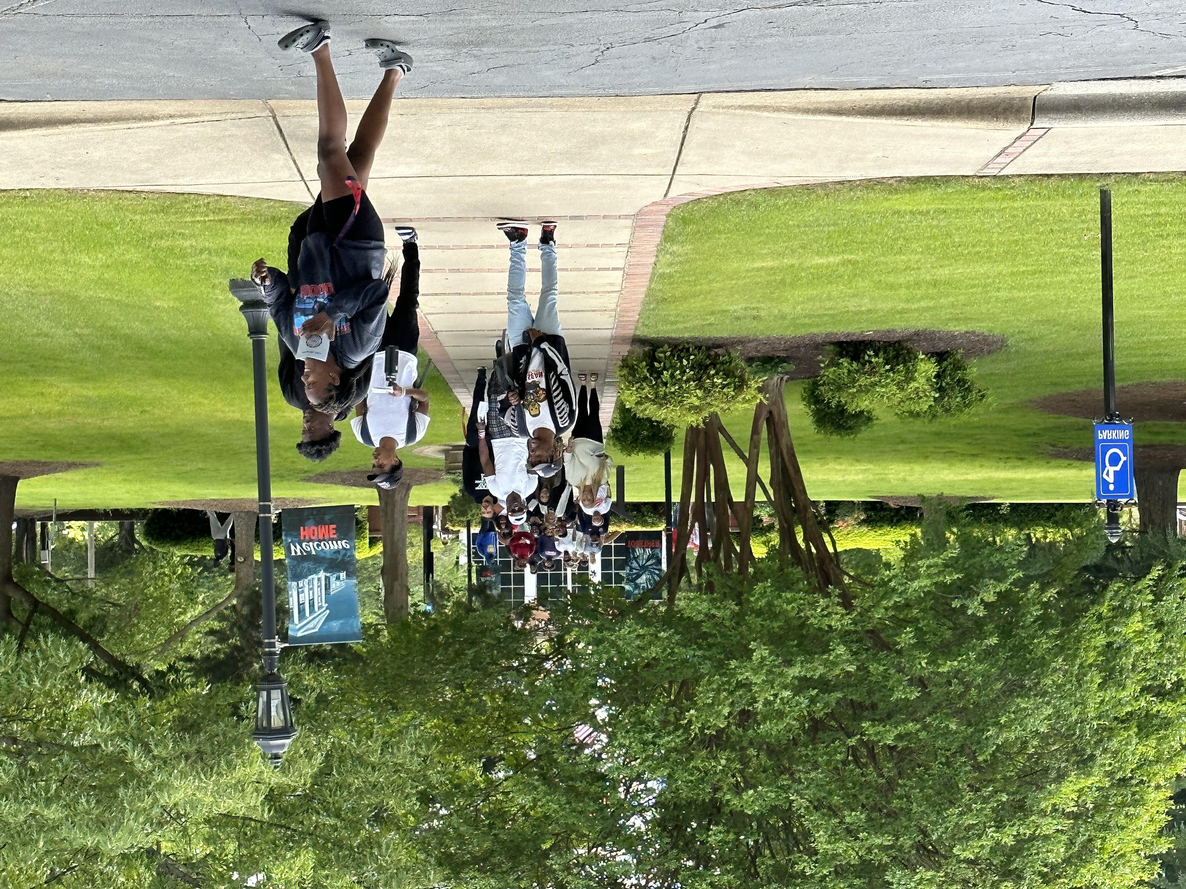 Students walking across campus.